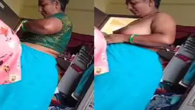Grandmother wearing blouse and showing naked boobs